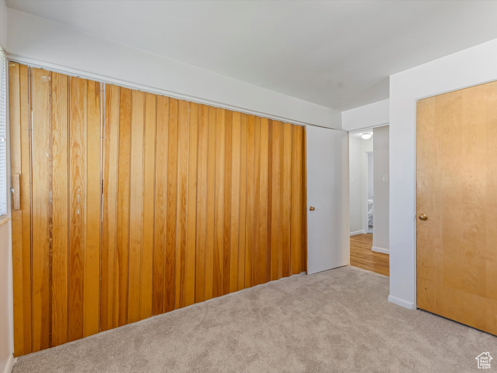 Unfurnished bedroom with carpet floors