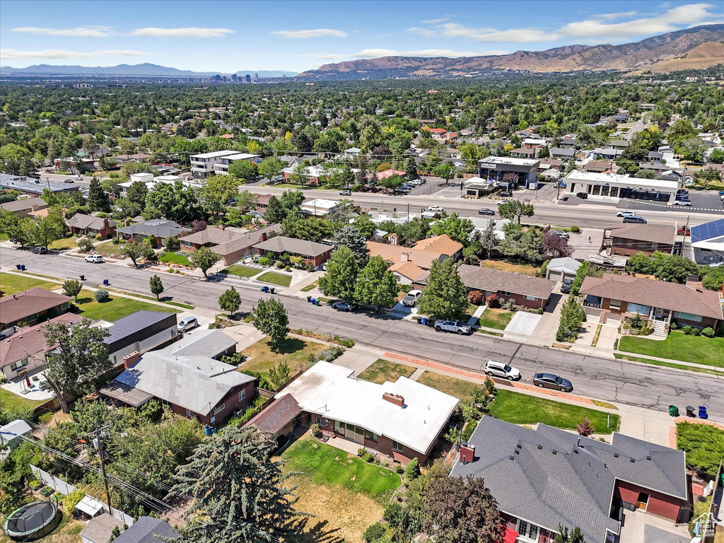 Aerial view of residential area with a mountain backdrop