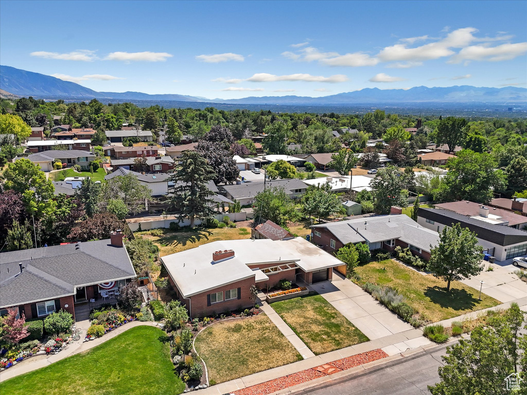 Aerial perspective of suburban area featuring mountains