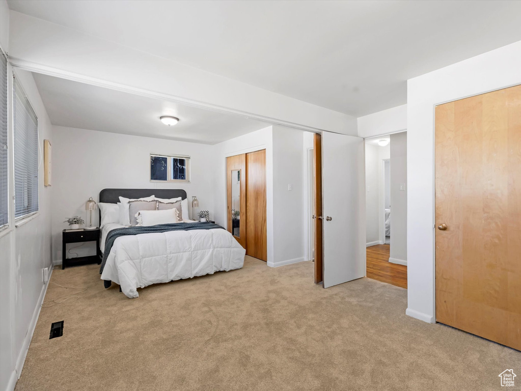 Bedroom featuring carpet floors