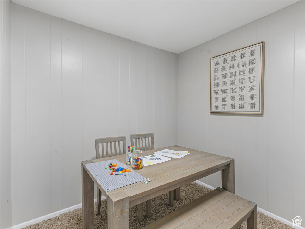 Dining space featuring carpet flooring