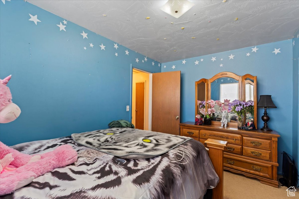 Bedroom with carpet flooring