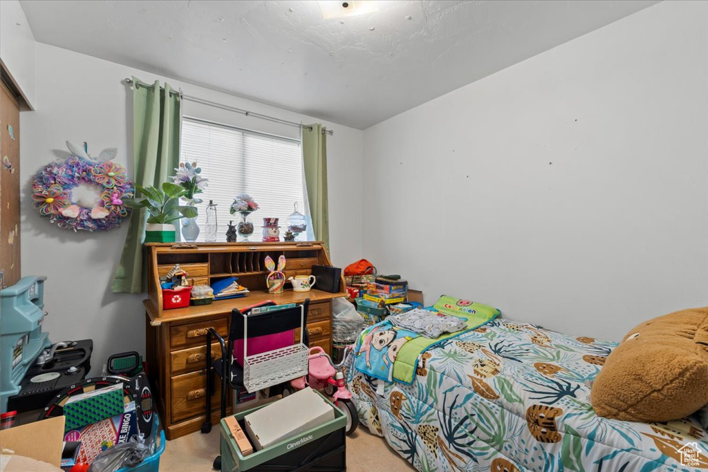 Bedroom featuring carpet