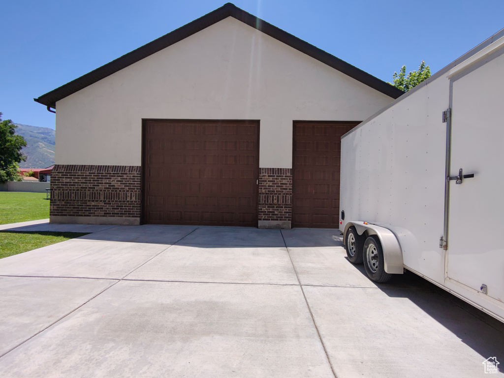 Detached garage with a mountain view
