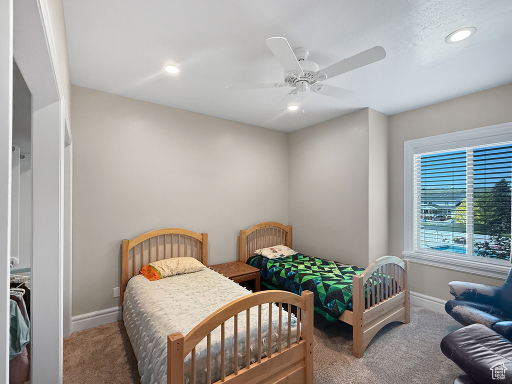Bedroom featuring carpet, recessed lighting, and ceiling fan