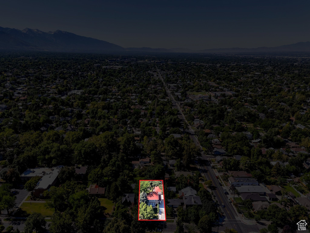 Aerial overview of property's location featuring property boundaries highlighted and mountains