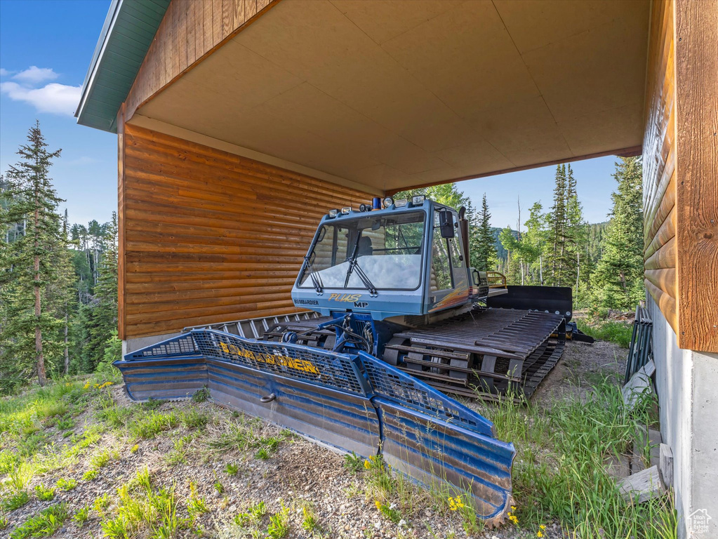View of yard featuring an attached carport