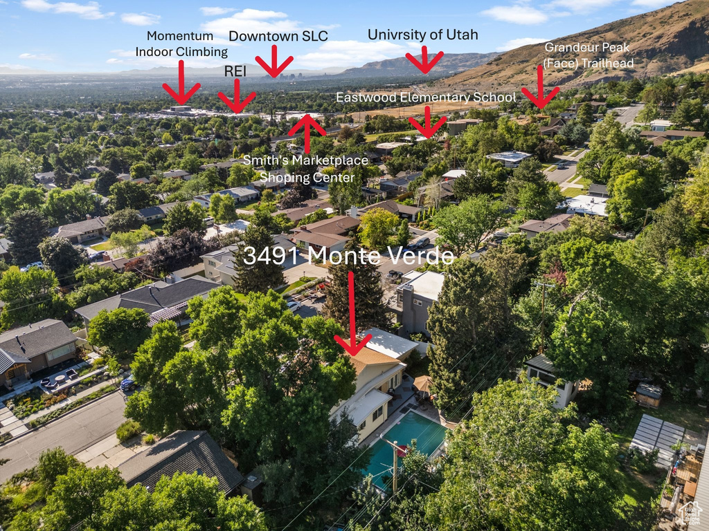 Aerial view of residential area with mountains