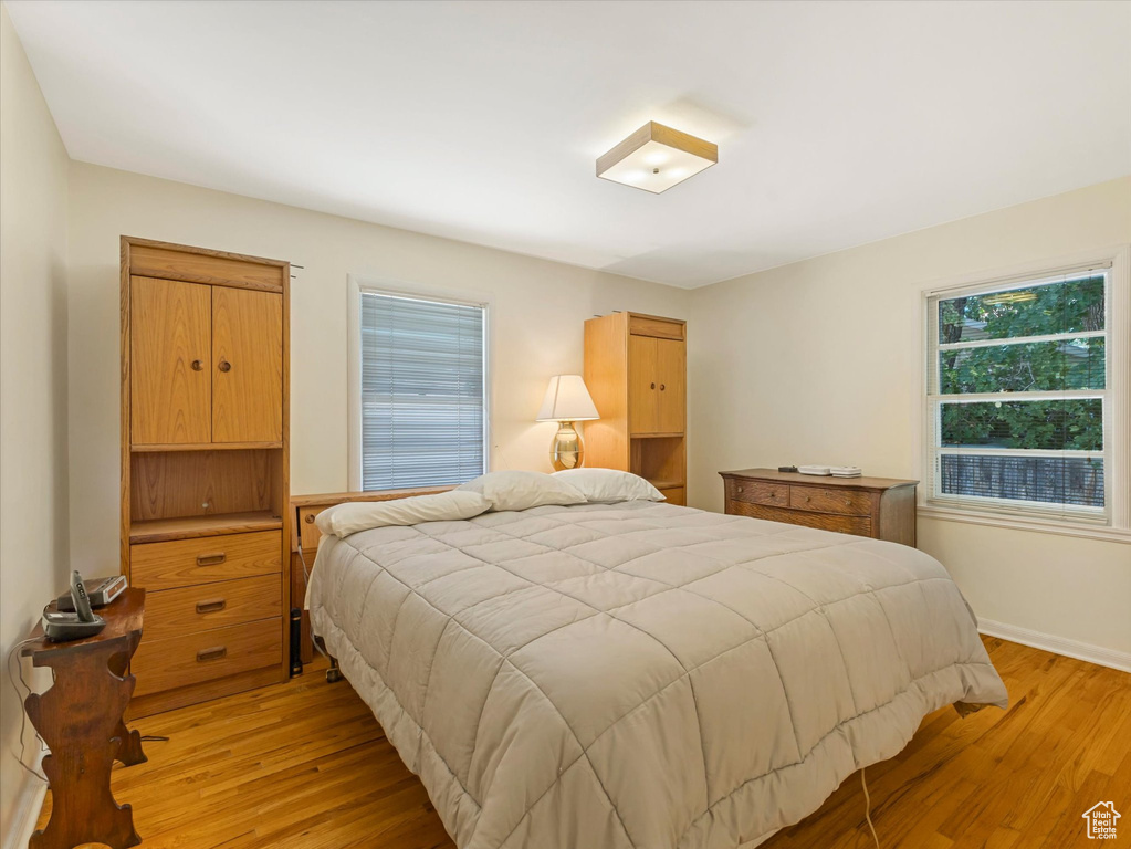Bedroom with light wood finished floors
