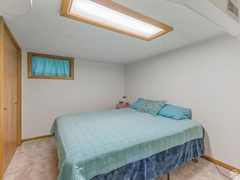 Bedroom featuring carpet flooring