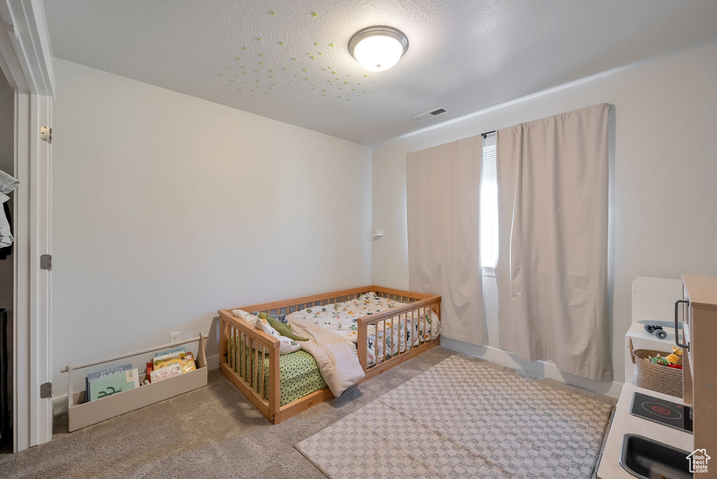 Bedroom with carpet floors