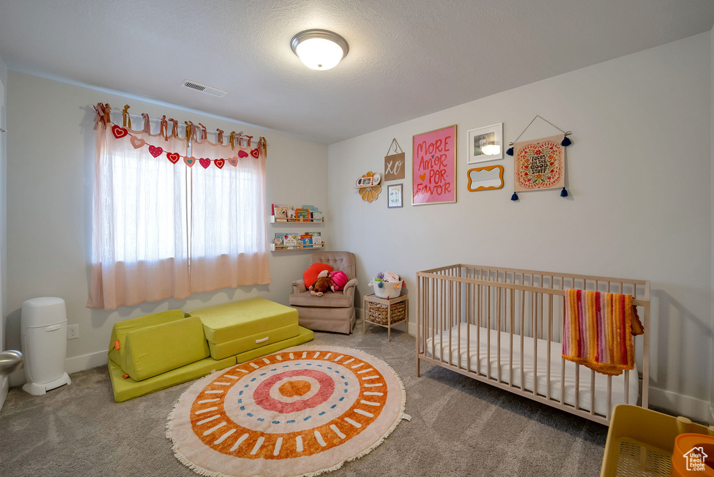 View of carpeted bedroom