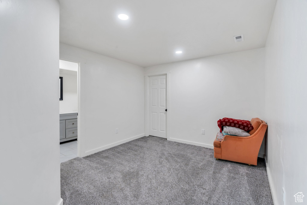 Unfurnished room featuring carpet and recessed lighting