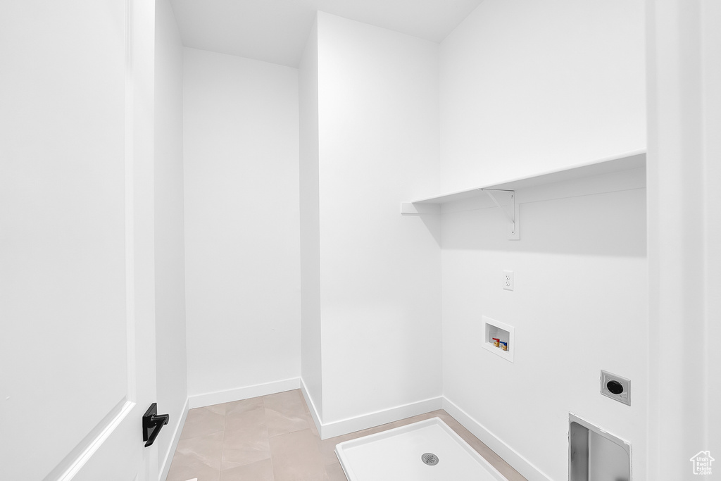 Washroom with electric dryer hookup and hookup for a washing machine