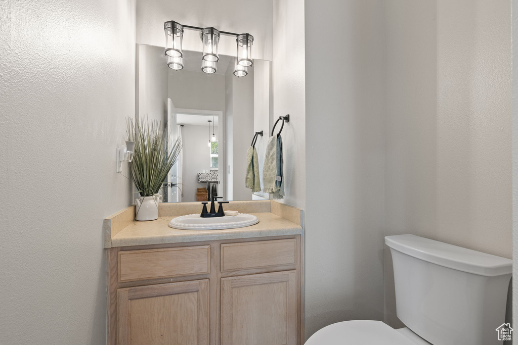 Bathroom with toilet and vanity