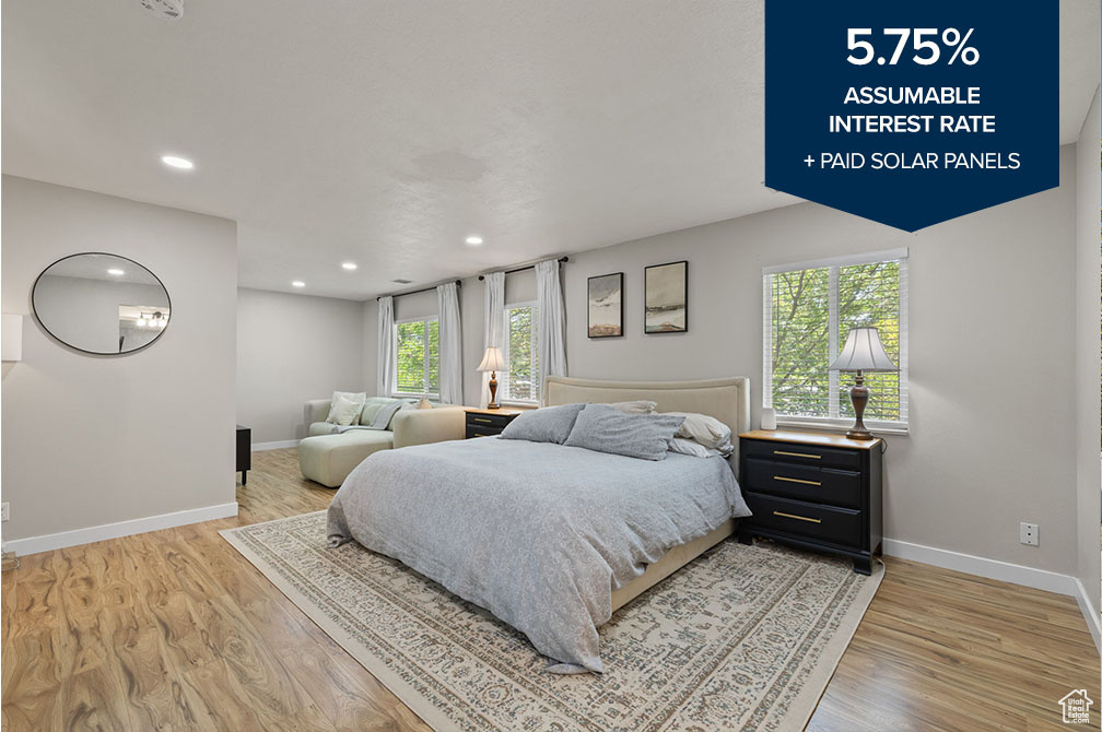 Bedroom featuring light wood finished floors and recessed lighting
