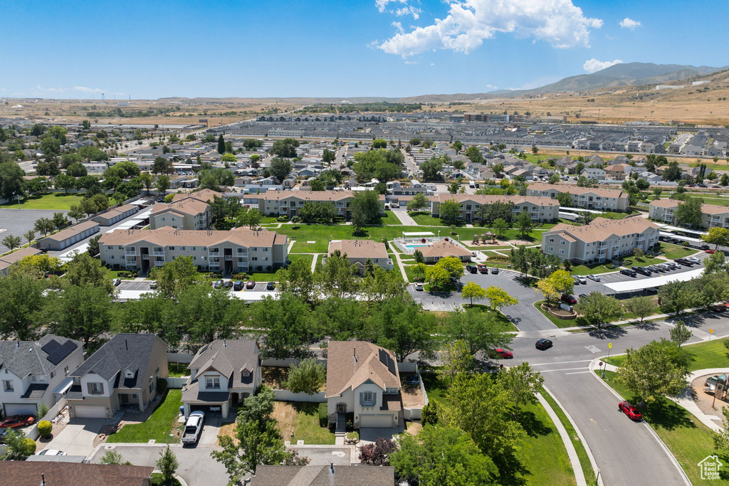 Aerial view of residential area with a mountain backdrop