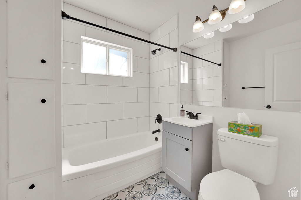 Full bathroom featuring vanity, tub / shower combination, and tile patterned floors