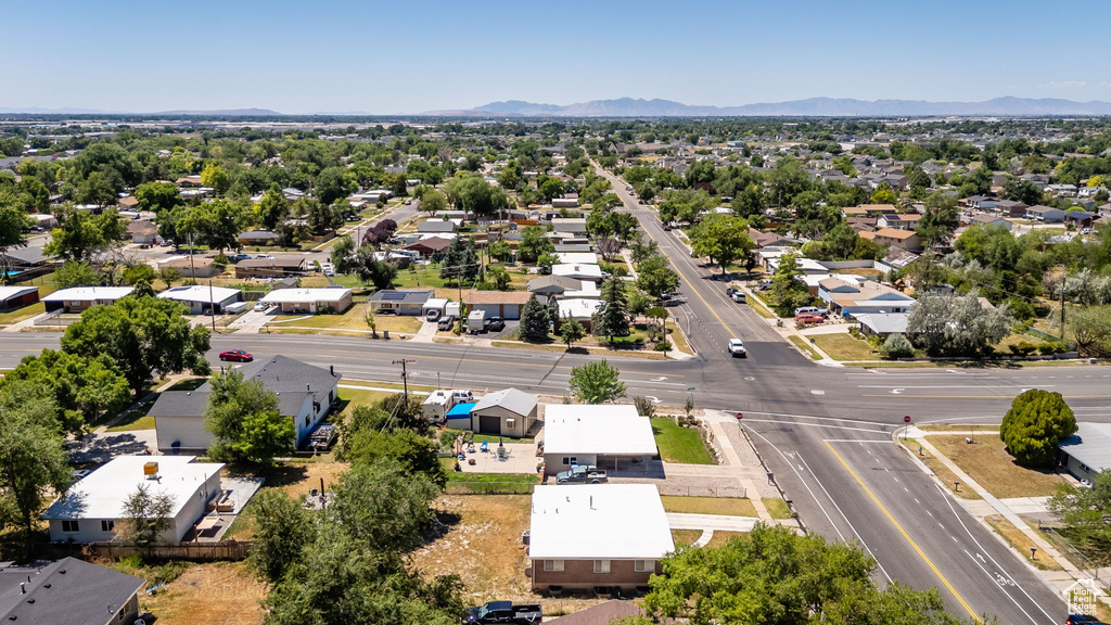 Aerial view of residential area with a mountainous background