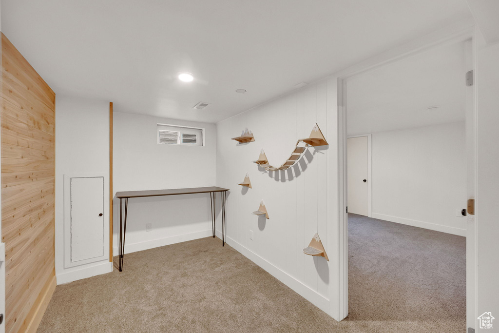 Corridor featuring carpet and recessed lighting
