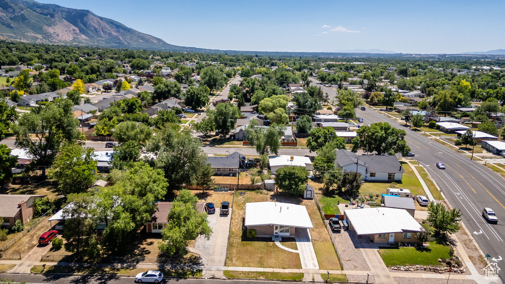 Aerial view of residential area with a mountain backdrop