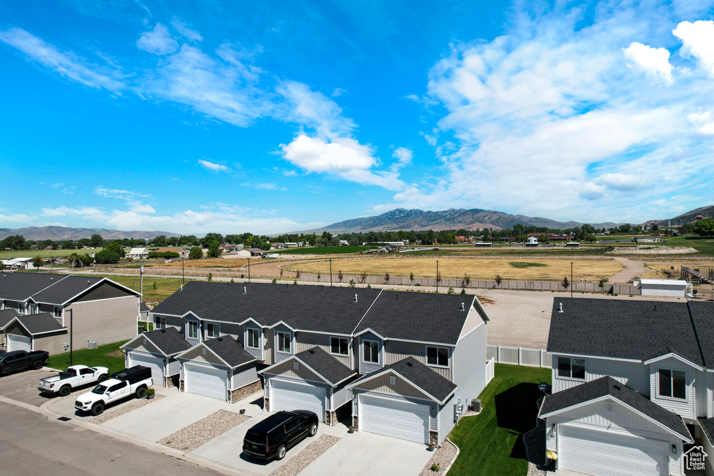 Aerial view of residential area with a mountainous background