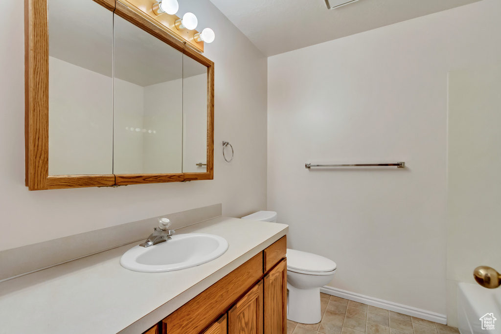 Bathroom featuring vanity and a bathtub