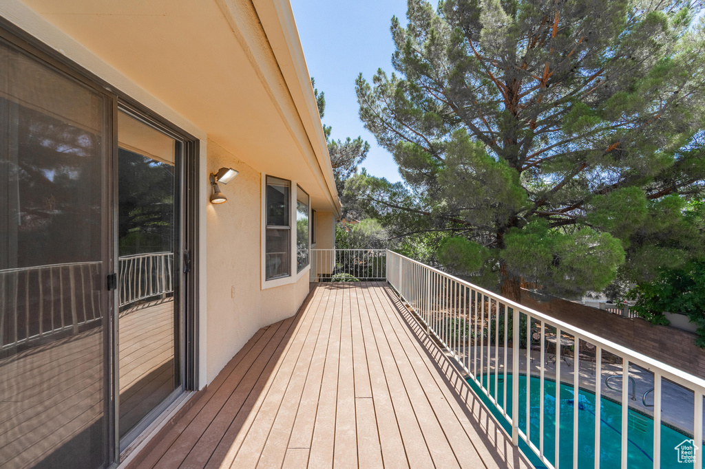 Wooden terrace featuring a fenced backyard