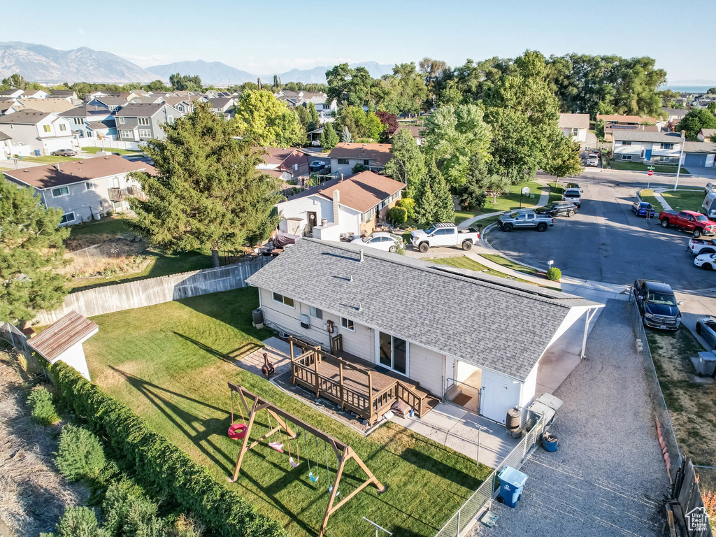 Aerial view of residential area with a mountain backdrop