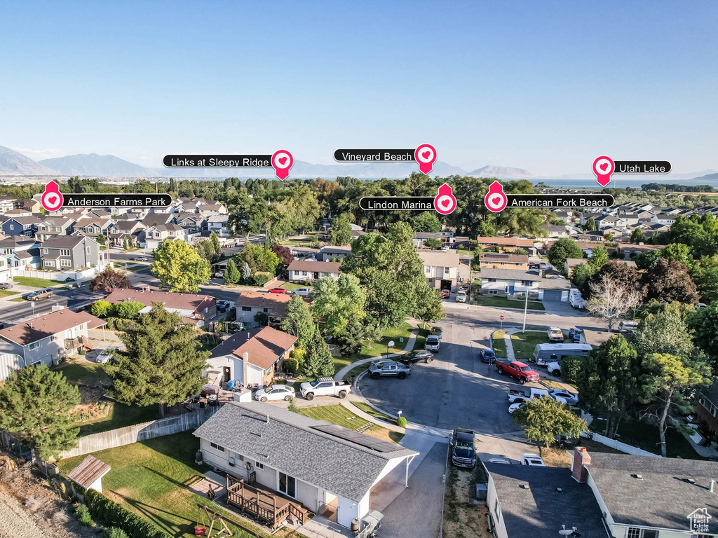 Aerial view of residential area with a mountainous background