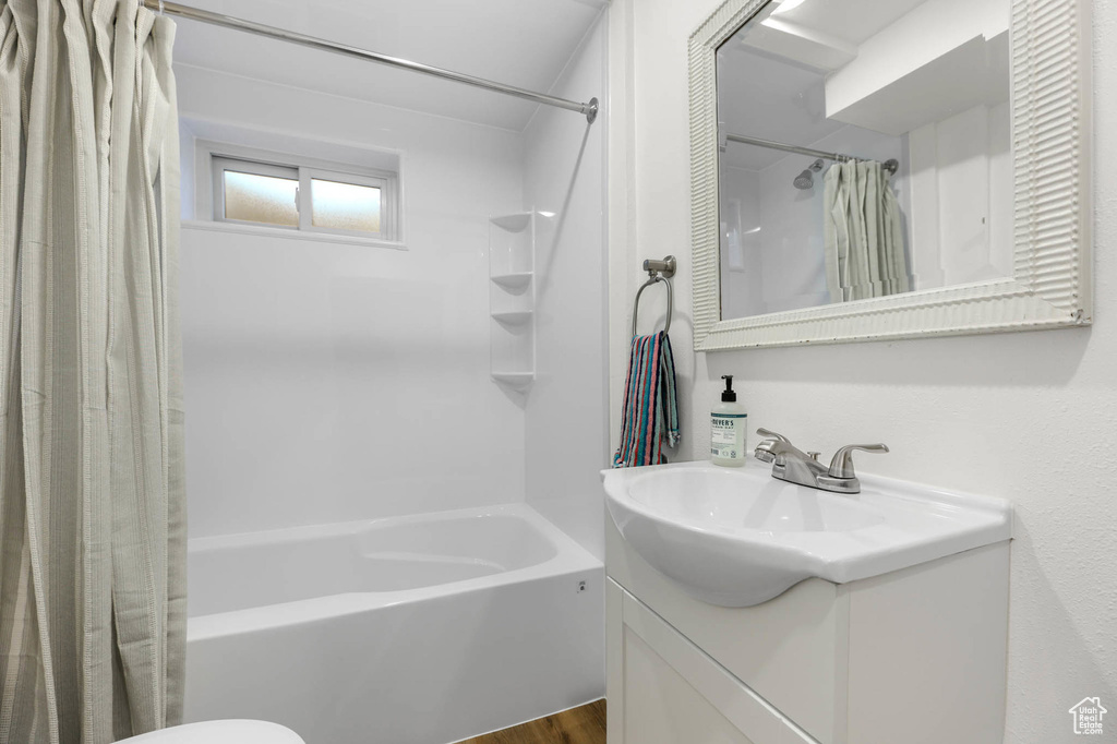 Full bathroom featuring vanity and shower / bath combo