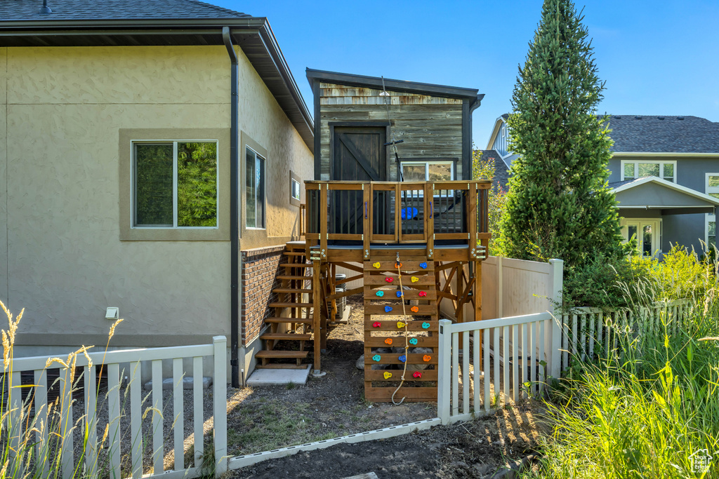 Back of property with stucco siding