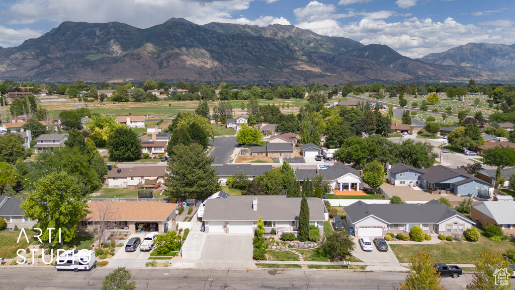 Aerial view of residential area with a mountain backdrop