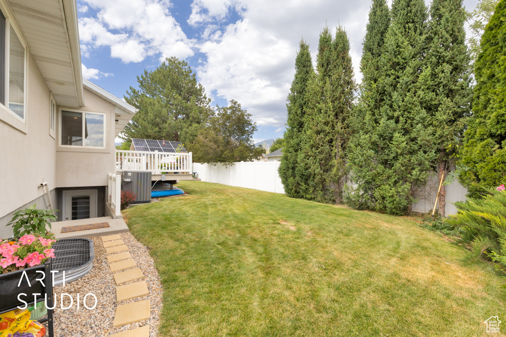 View of yard featuring a deck