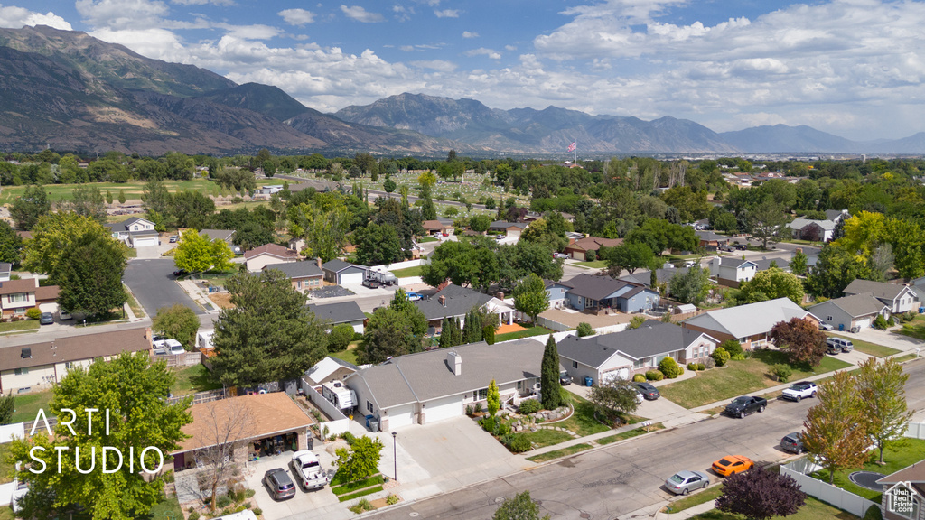 Aerial view of residential area with a mountain backdrop