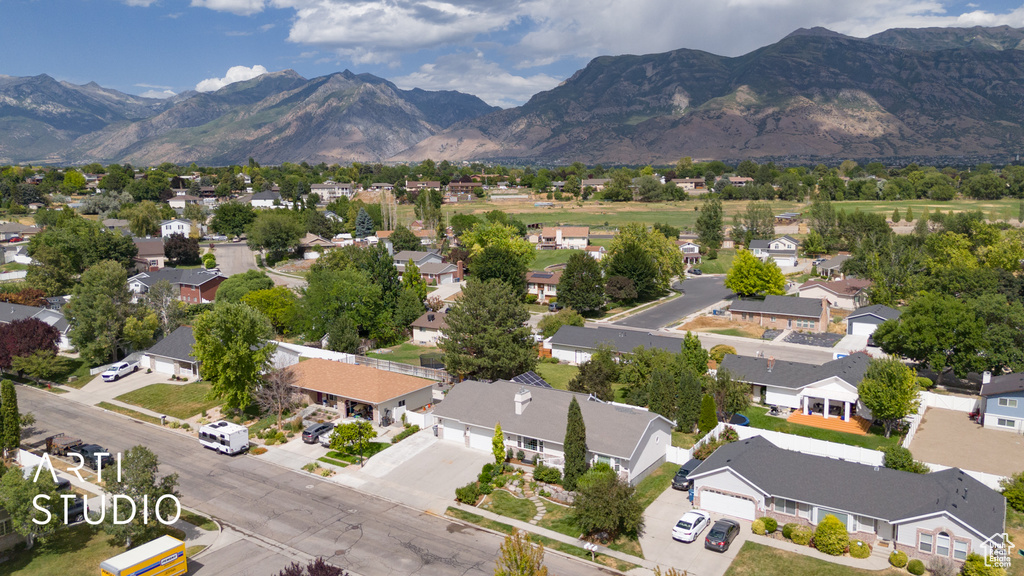 Aerial view of residential area with a mountain backdrop