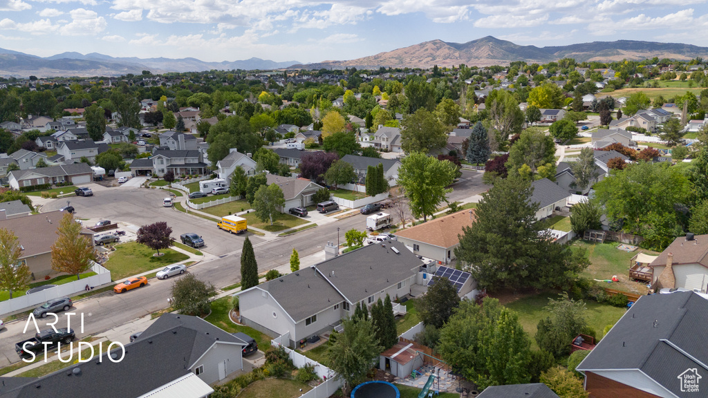 Aerial view of residential area with a mountain backdrop