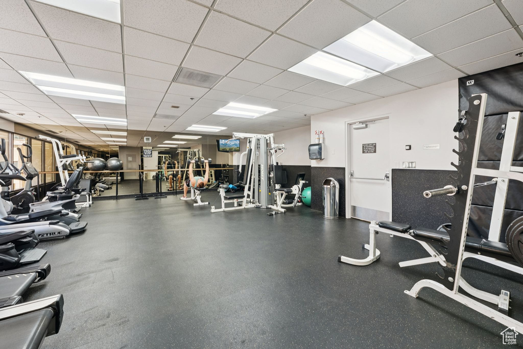 Exercise room featuring a drop ceiling