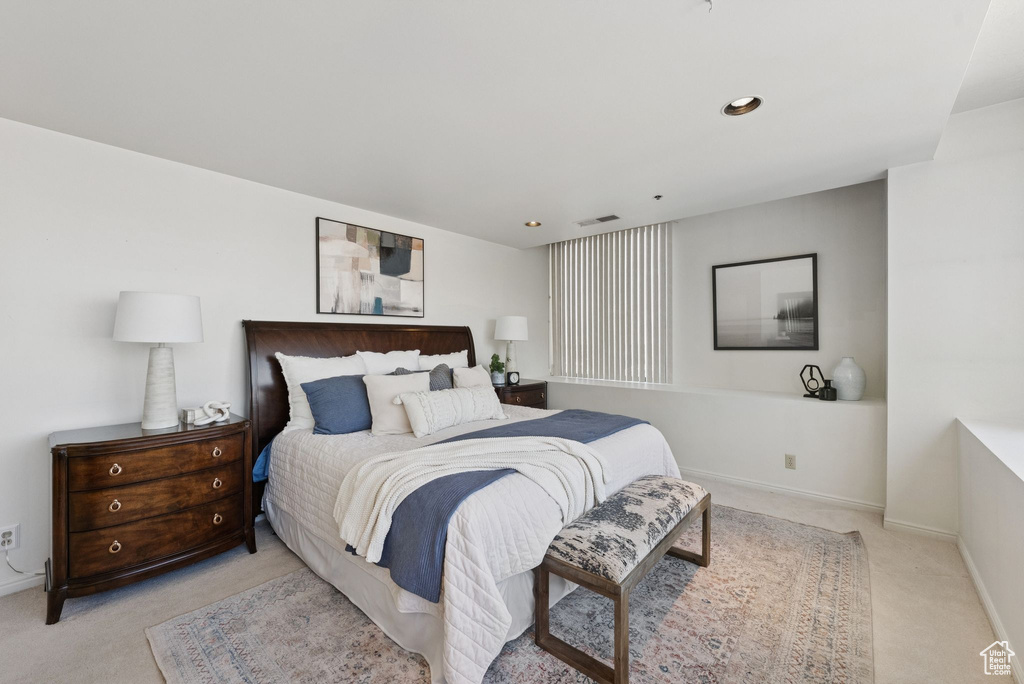 Bedroom with carpet floors and recessed lighting