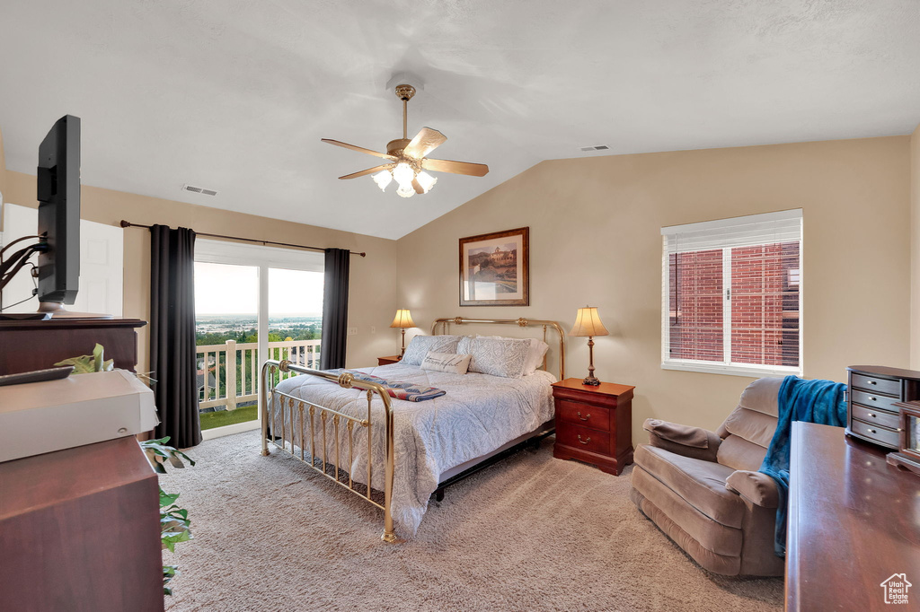 Bedroom with carpet flooring, lofted ceiling, access to outside, and a ceiling fan