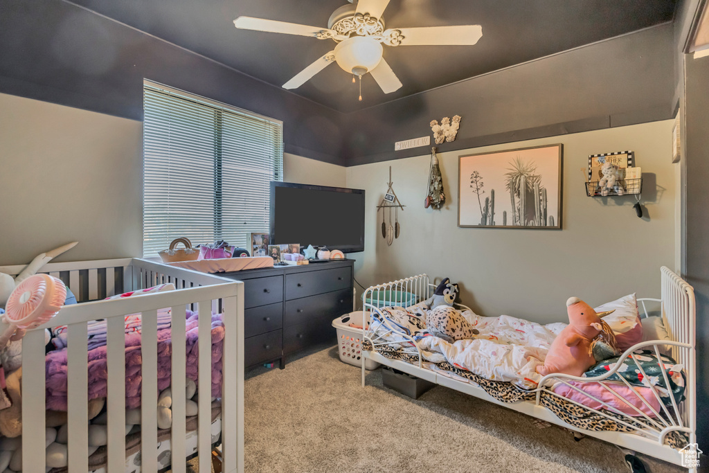 Bedroom with carpet floors and ceiling fan