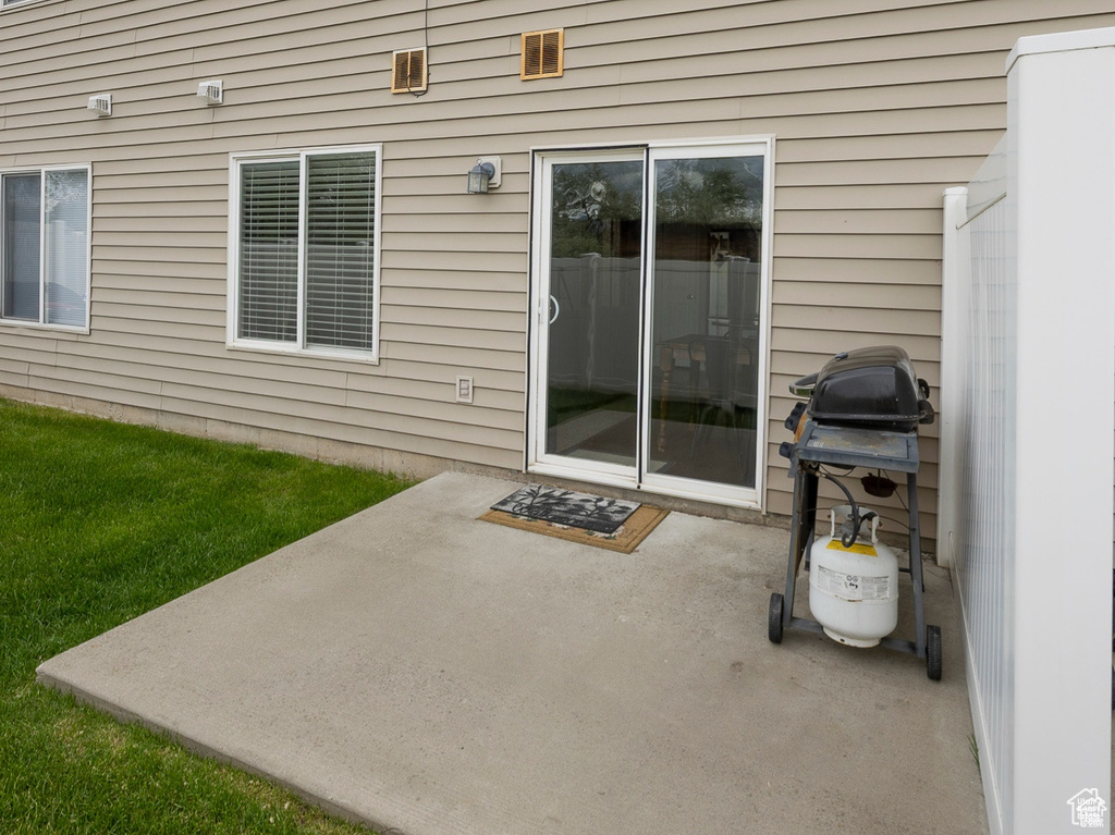 View of patio / terrace featuring a grill