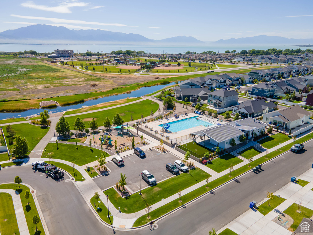 Aerial view of a water and mountain view and a pool