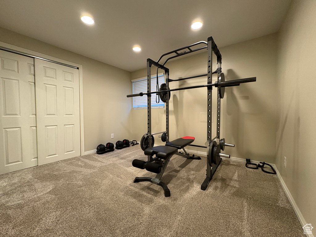 Workout area featuring recessed lighting and carpet flooring
