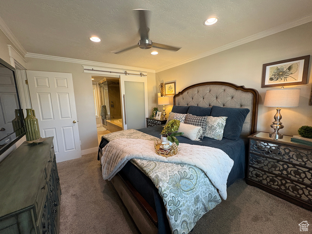 Carpeted bedroom featuring recessed lighting, crown molding, ceiling fan, connected bathroom, and a textured ceiling
