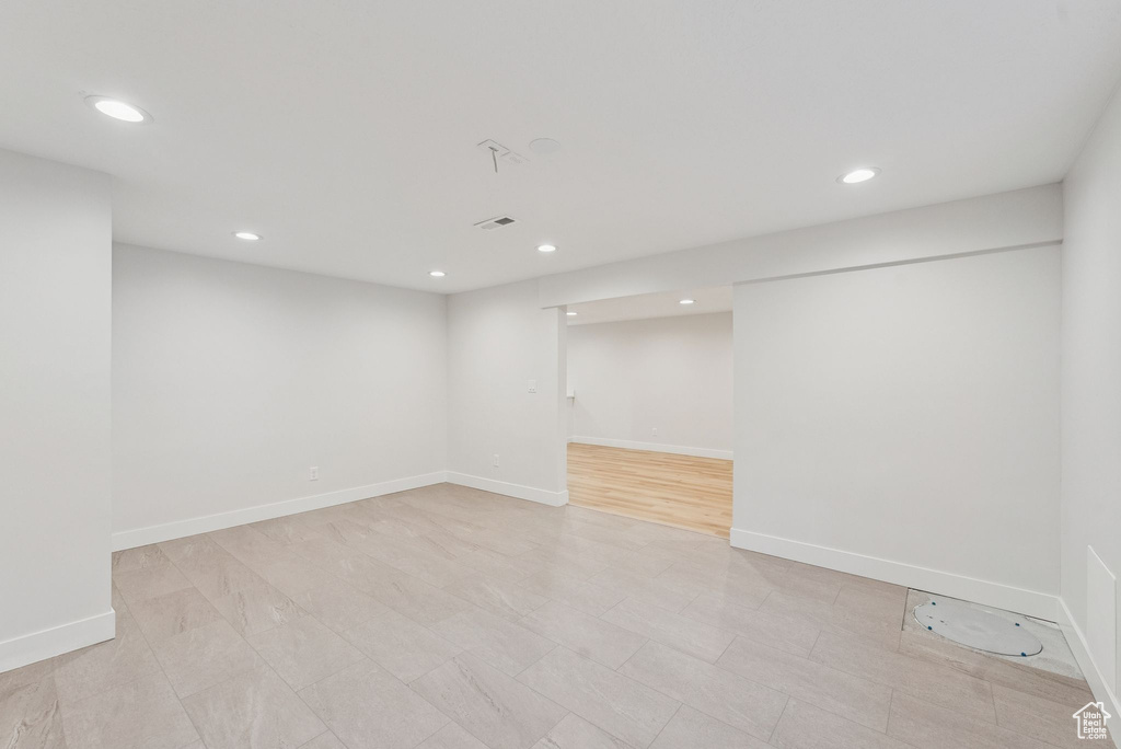 Finished basement with recessed lighting