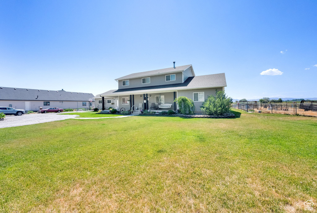 View of front of property featuring covered porch