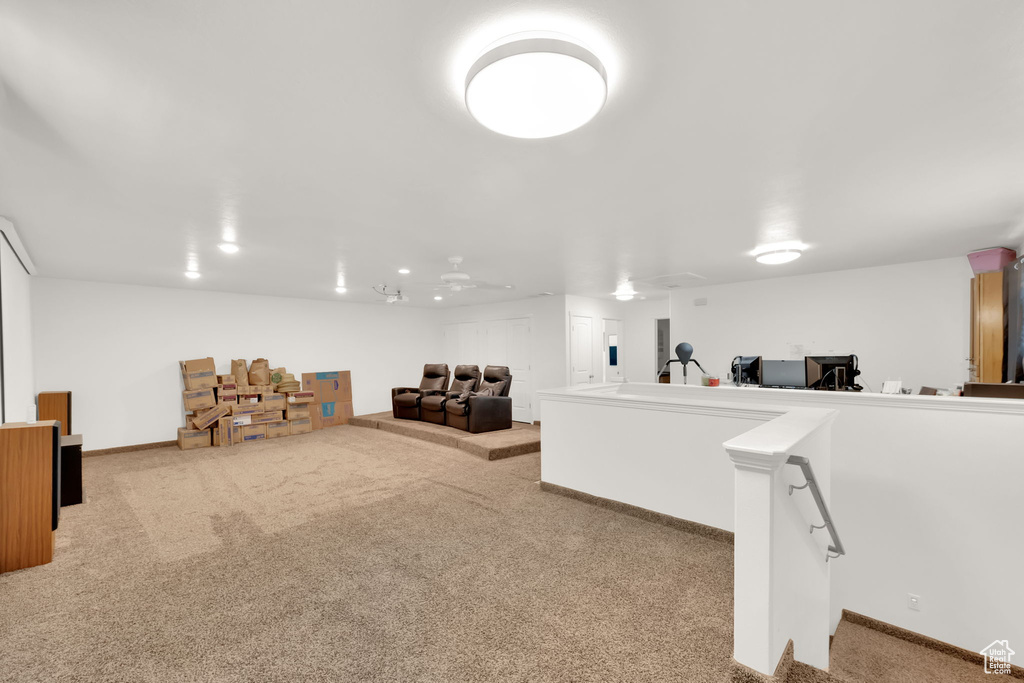 Living room featuring carpet floors and baseboards