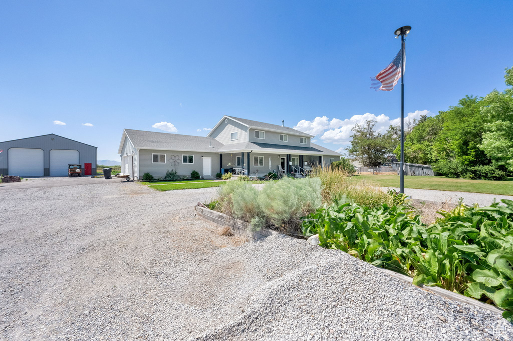 View of front of property featuring a garage