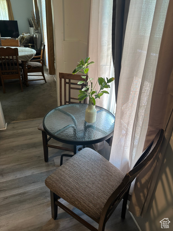 Dining area with wood finished floors
